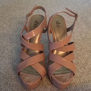 Shi by journeys heels.